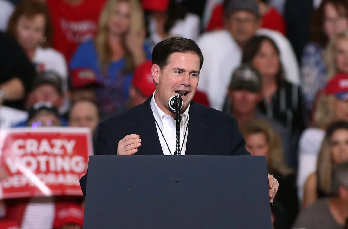 Arizona Gov. Doug Ducey speaks during a rally for President Donald Trump at the International Air Response facility in Mesa, Arizona on Oct. 19, 2018. (Ralph Freso/Getty Images)