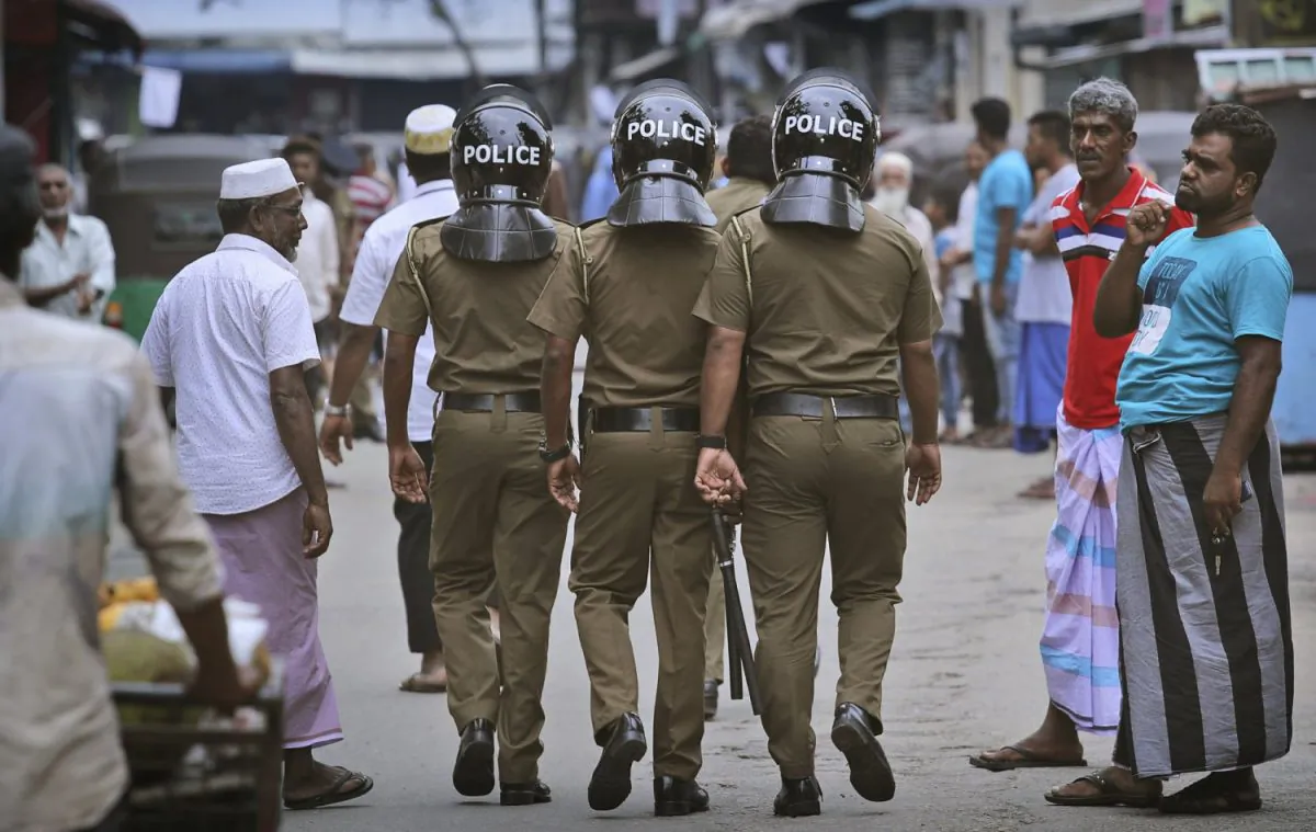 Sri Lankan policeman patrol in a Muslim neighborhood before Friday prayers in Colombo, Sri Lanka on April 26, 2019. (Manish Swarup/AP)