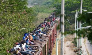 Hundreds of Migrants in Southern Mexico Board 'The Beast' Heading North
