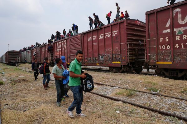 Central American migrants, moving in a caravan through Juchitan
