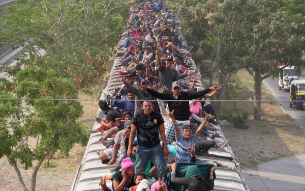 Central American migrants, moving in a caravan through Juchitan,