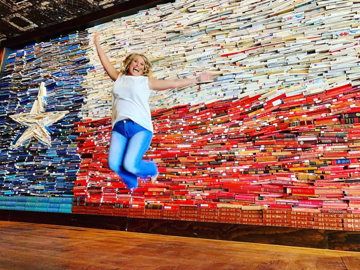 The George hotel in College Station features a wall depicting the Texan flag—made of books. (Ron Stern)