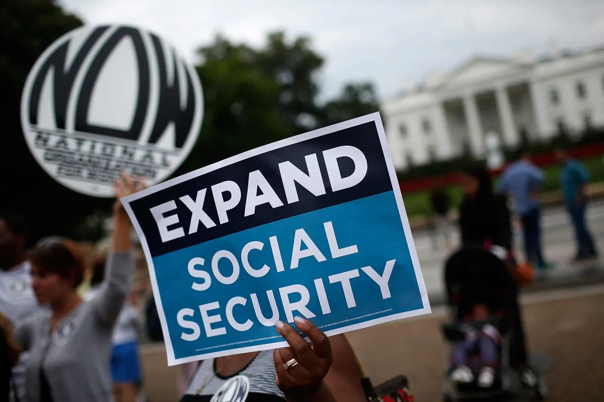 Activists participate in a rally urging the expansion of Social Security benefits in front of the White House in Washington on July 13, 2015. (Win McNamee/Getty Images)