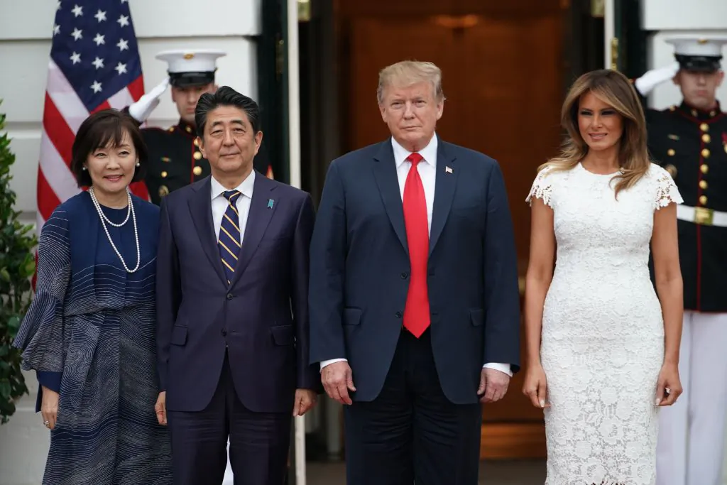 U.S. President Donald Trump and First Lady Melania Trump greet Japan's Prime Minister Shinzo Abe and his wife Akie Abe at the South Portico of the White House as they arrive for dinner in Washington, on April 26, 2019. (MANDEL NGAN/AFP/Getty Images)