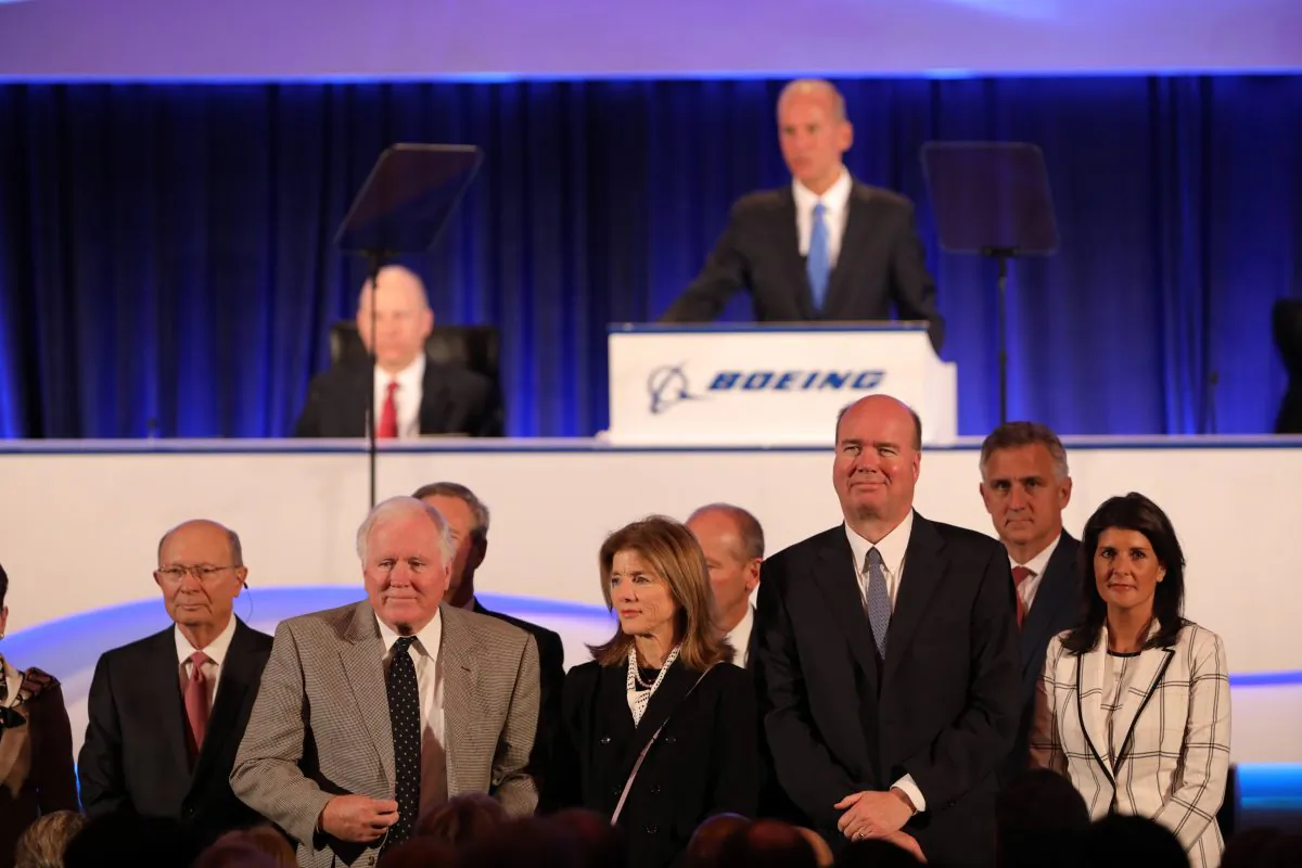 The Boeing board of directors, including Nikki Haley (R) and Caroline Kennedy (3rd from right), is announced by CEO Dennis Muilenburg during at the Boeing Annual General Meeting in Chicago on April 29, 2019. REUTERS/John Gress