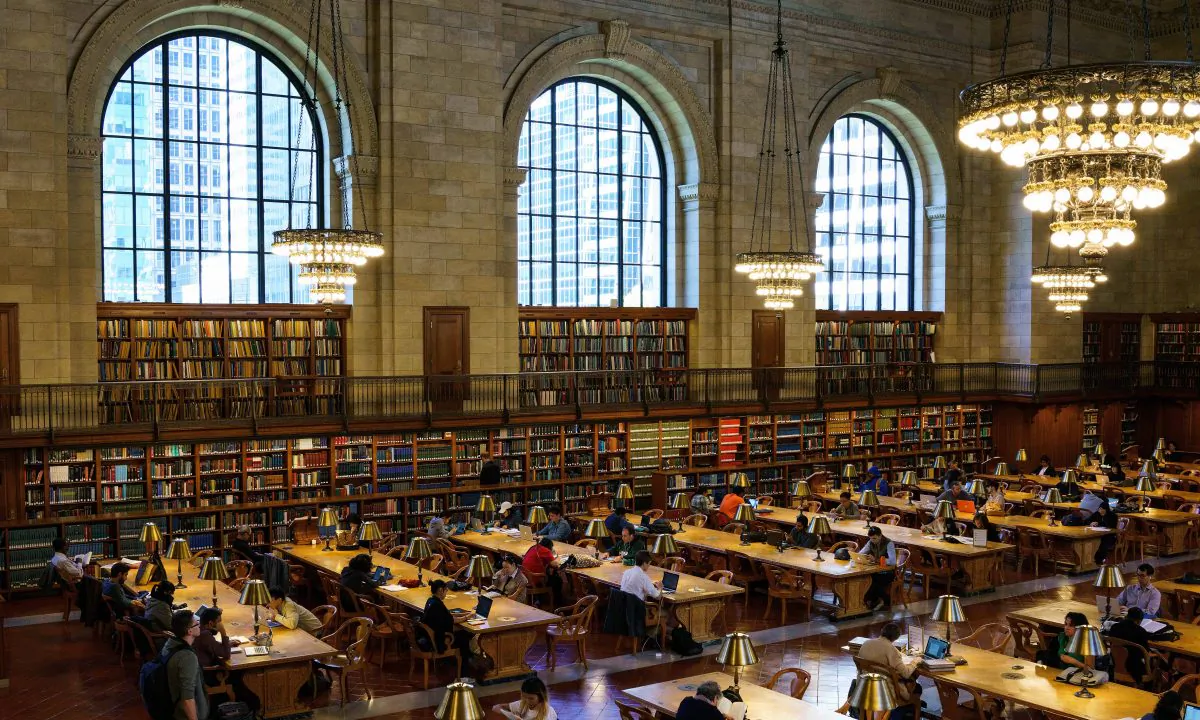 People work at desks in the Rose Main Reading Room at the New York Public Library, October 5, 2016 in New York City.  Drew Angerer/Getty Images