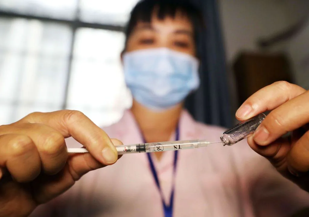 A nurse prepares a vaccination shot at a hospital in Rongan in southern China's Guangxi region on July 23, 2018. (AFP/Getty Images)