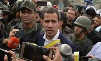 Armored Vehicle Runs Down Protesters as Clashes Intensify in Venezuela