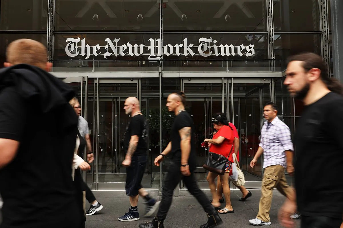 People walk past The New York Times building in New York City on July 27, 2017.  (Spencer Platt/Getty Images)