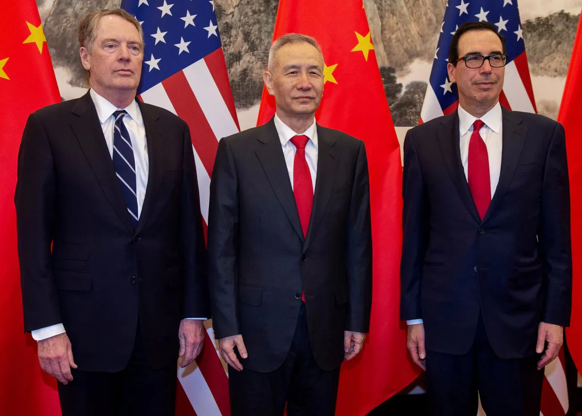 China's Vice Premier Liu He (C) pose for a photo with U.S. Treasury Secretary Steven Mnuchin (R) and U.S. Trade Representative Robert Lighthizer (L) at Diaoyutai State Guesthouse in Beijing on March 29, 2019. (Nicolas Asfouri/Pool via Reuters)