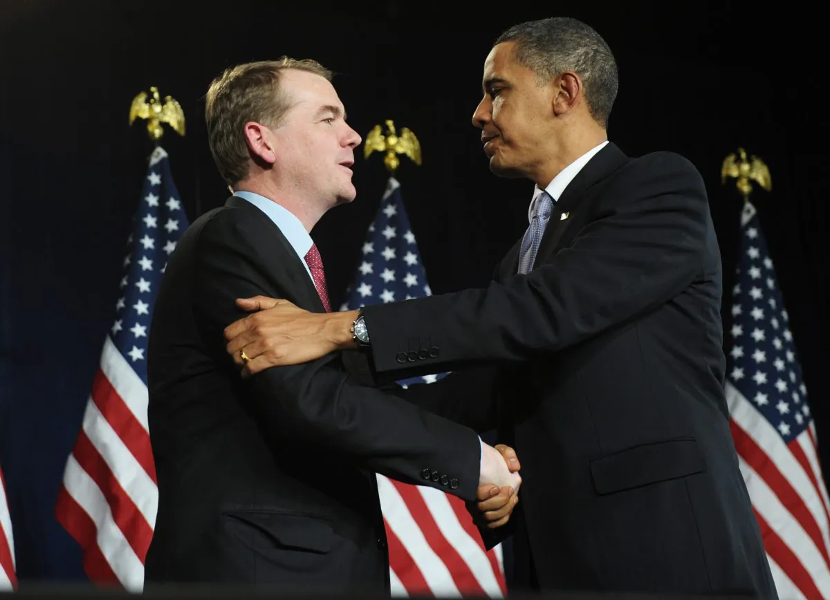 Senator Michael Bennet [D-Colo.] shakes hands with President Barack Obama in Denver on Feb. 18, 2010. (MANDEL NGAN/AFP/Getty Images)
