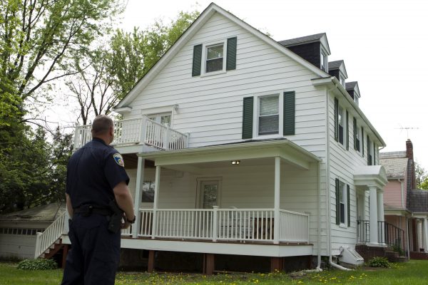 Baltimore police officer stand outside the house of Baltimore Mayor Catherine Pugh in Baltimore,