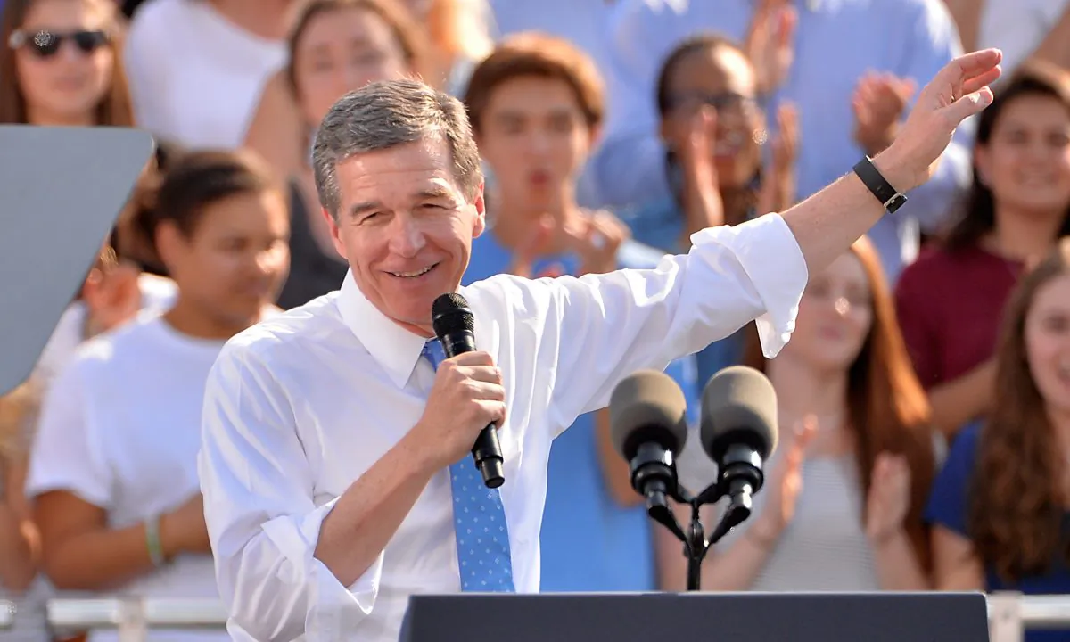 Democratic Governor nominee Roy Cooper campaigns during an event for Democratic presidential nominee Hillary Clinton on the campus of the University of Chapel Hill on November 2, 2016 in Chapel Hill, North Carolina.  Sara D. Davis/Getty Images