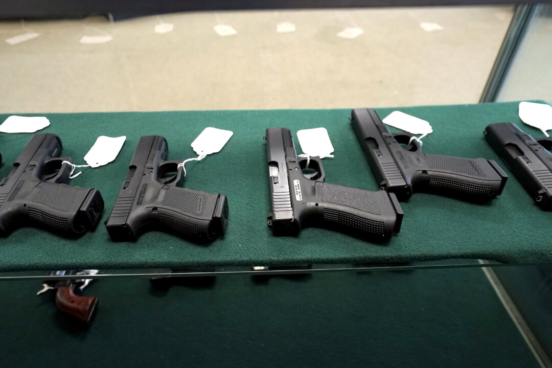 A selection of Glock pistols are seen for sale at the Pony Express Firearms shop in Parker, Colo., on Dec. 7, 2015. (Rick Wilking/Reuters)