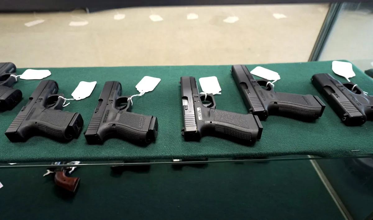 A selection of Glock pistols are seen for sale at the Pony Express Firearms shop in Parker, Colo., on Dec. 7, 2015. (Rick Wilking/Reuters)
