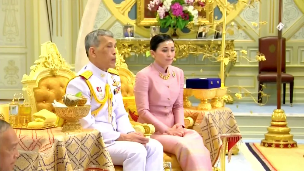 King Maha Vajiralongkorn and his consort, General Suthida Vajiralongkorn named Queen Suthida attend their wedding ceremony in Bangkok, Thailand May 1, 2019. (Thai TV Pool)