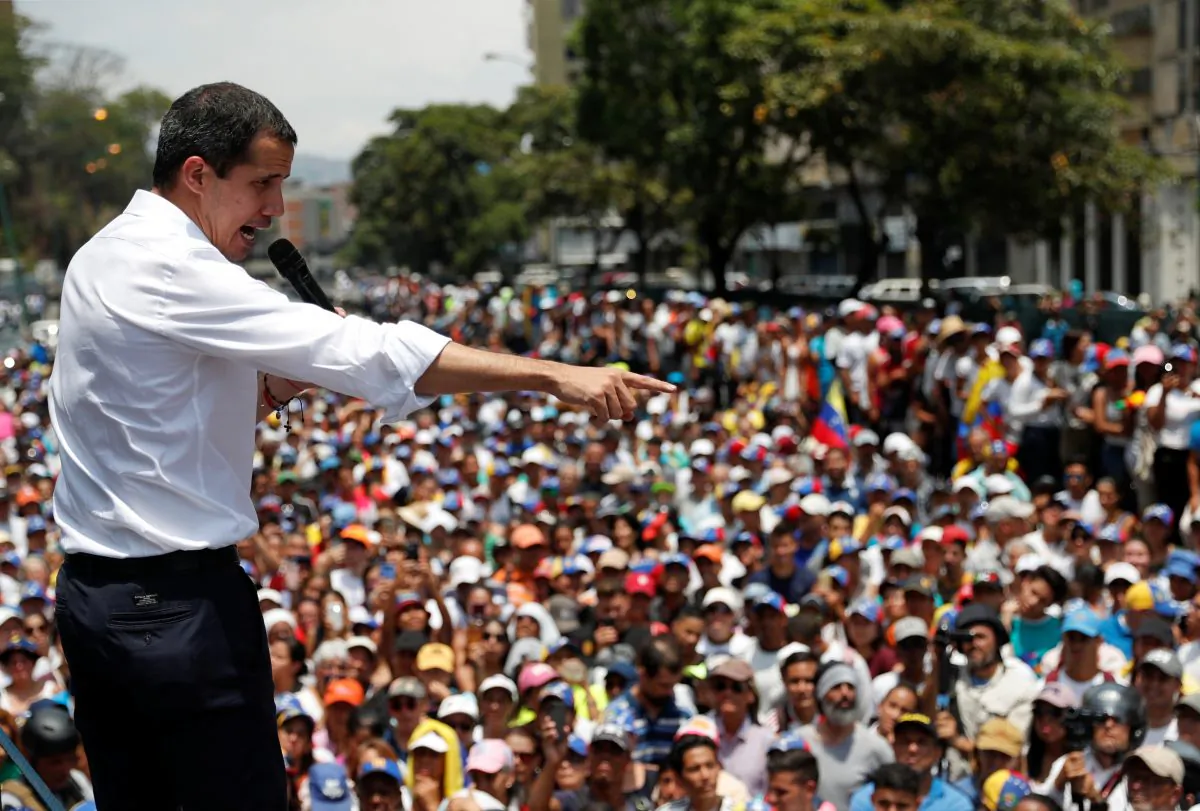 Venezuelan opposition leader Juan Guaido, who many nations have recognised as the country's rightful interim ruler, gestures as he speaks to supporters during a rally against the government of Venezuela's Nicolas Maduro and to commemorate May Day in Caracas Venezuela, May 1, 2019. (Carlos Garcia Rawlins/Reuters)