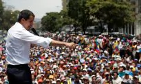 Maduro Hangs On After Caracas Protests, One Woman Dead