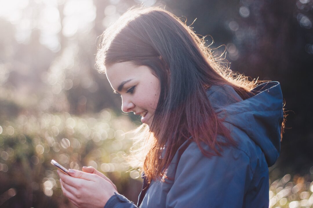 Our phones absorb the time and attention we need for our physical health, but researchers hope they can also be used to help us understand what it will take to get us active. (Luke Porter/Unsplash)