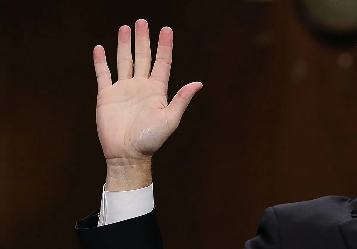 An American takes the oath before testifying to the Senate Judiciary Committee on Capitol Hill Sept. 27, 2018. (Win McNamee/Getty Images)