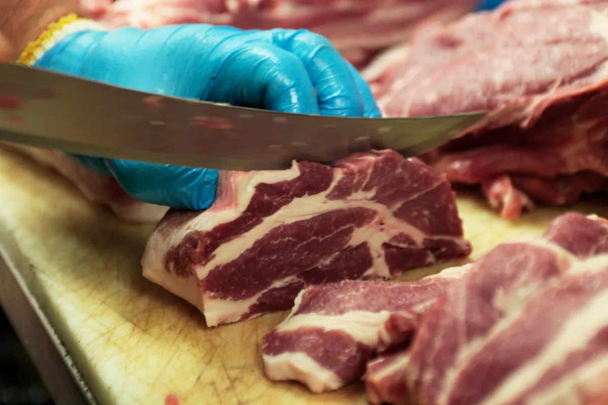 Canadian pork shoulders being prepped on a butcher's counter at North Hill Meats in Toronto, Ontario, Canada on May 10, 2017. (Hyungwon Kang/Reuters)
