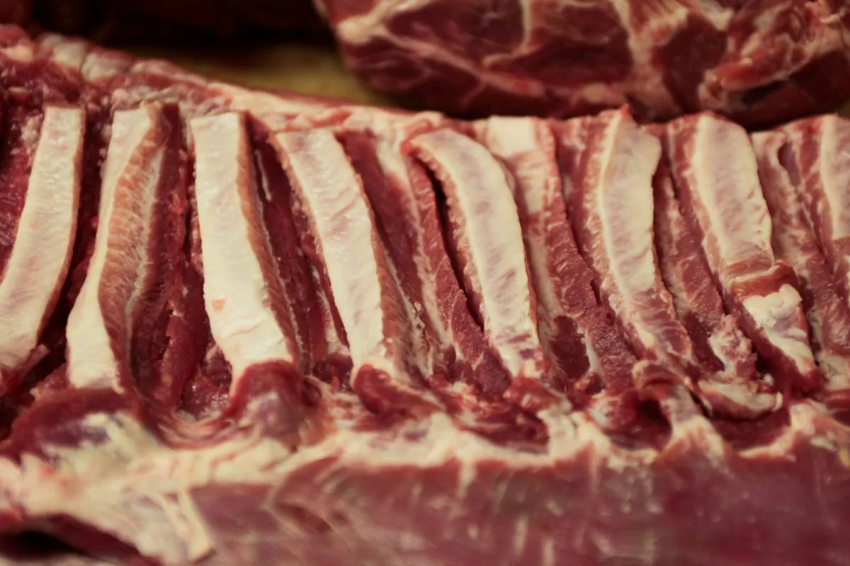 Canadian pork belly is being prepped on a butcher's counter at North Hill Meats in Toronto, Ontario, Canada on May 10, 2017. (Hyungwon Kang/Reuters)