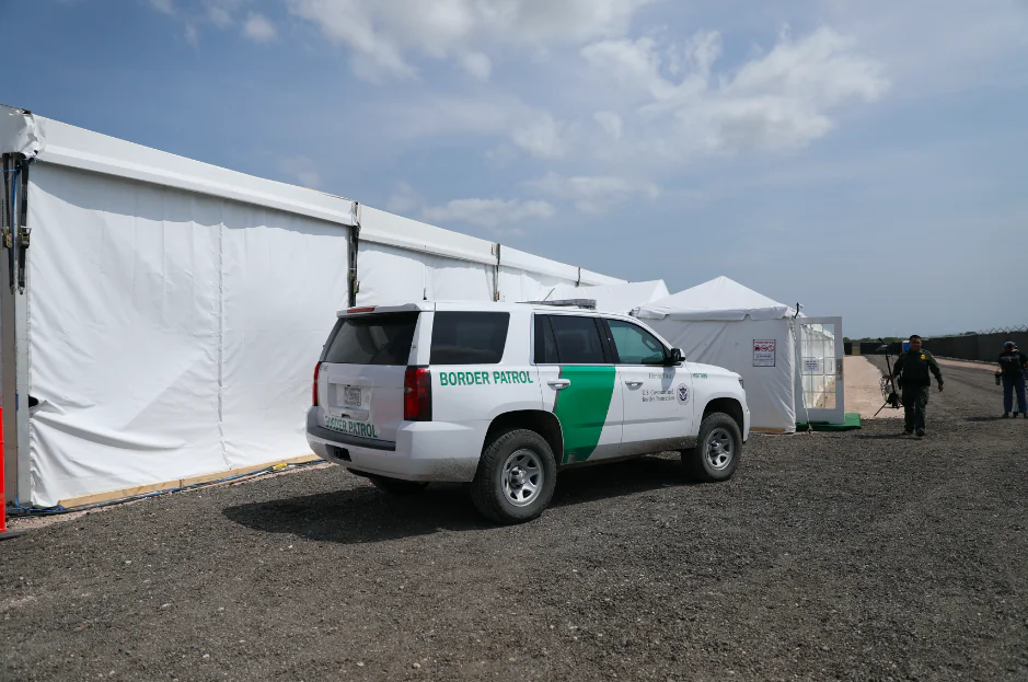 A Border Patrol truck sits outside a new Border Patrol tent facility for processing and holding illegal immigrants in Donna, Texas, on May 2, 2019. (Charlotte Cuthbertson/The Epoch Times)