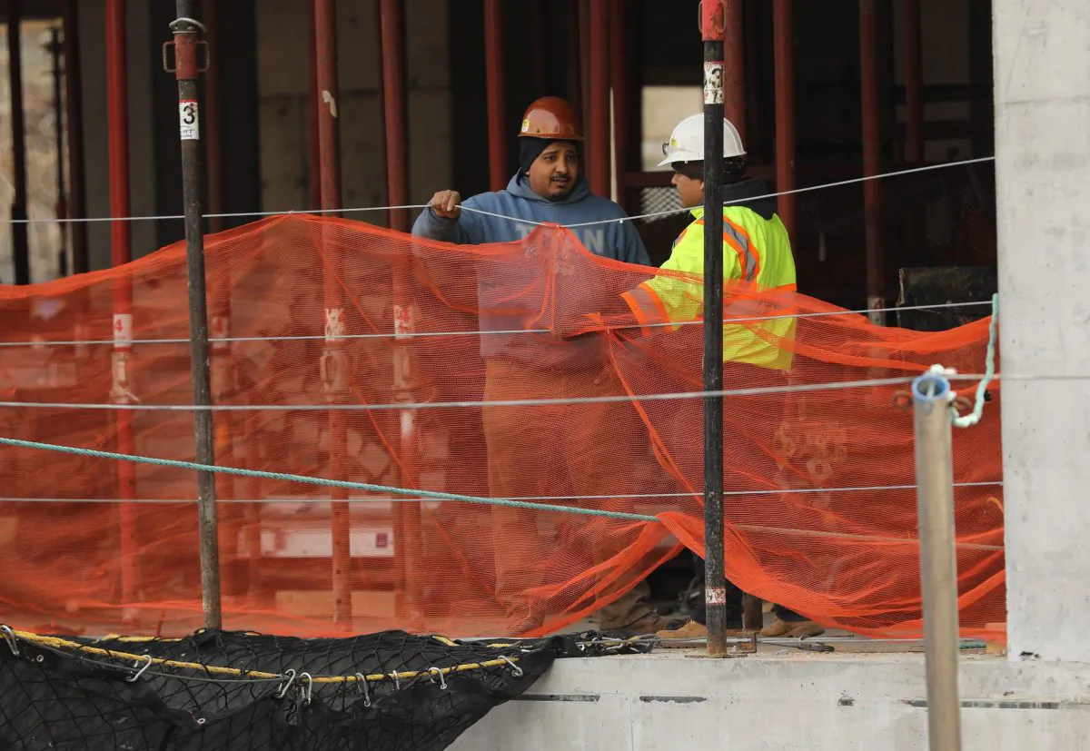 Construction workers are seen at a building site in New York City on March 8, 2019. (Spencer Platt/Getty Images)