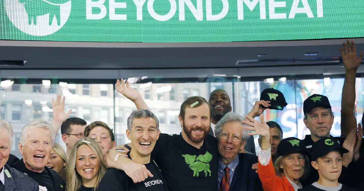 Ethan Brown, center, CEO of Beyond Meat, attends the Opening Bell ceremony with guests to celebrate the company's IPO at Nasdaq in New York on May 2, 2019.