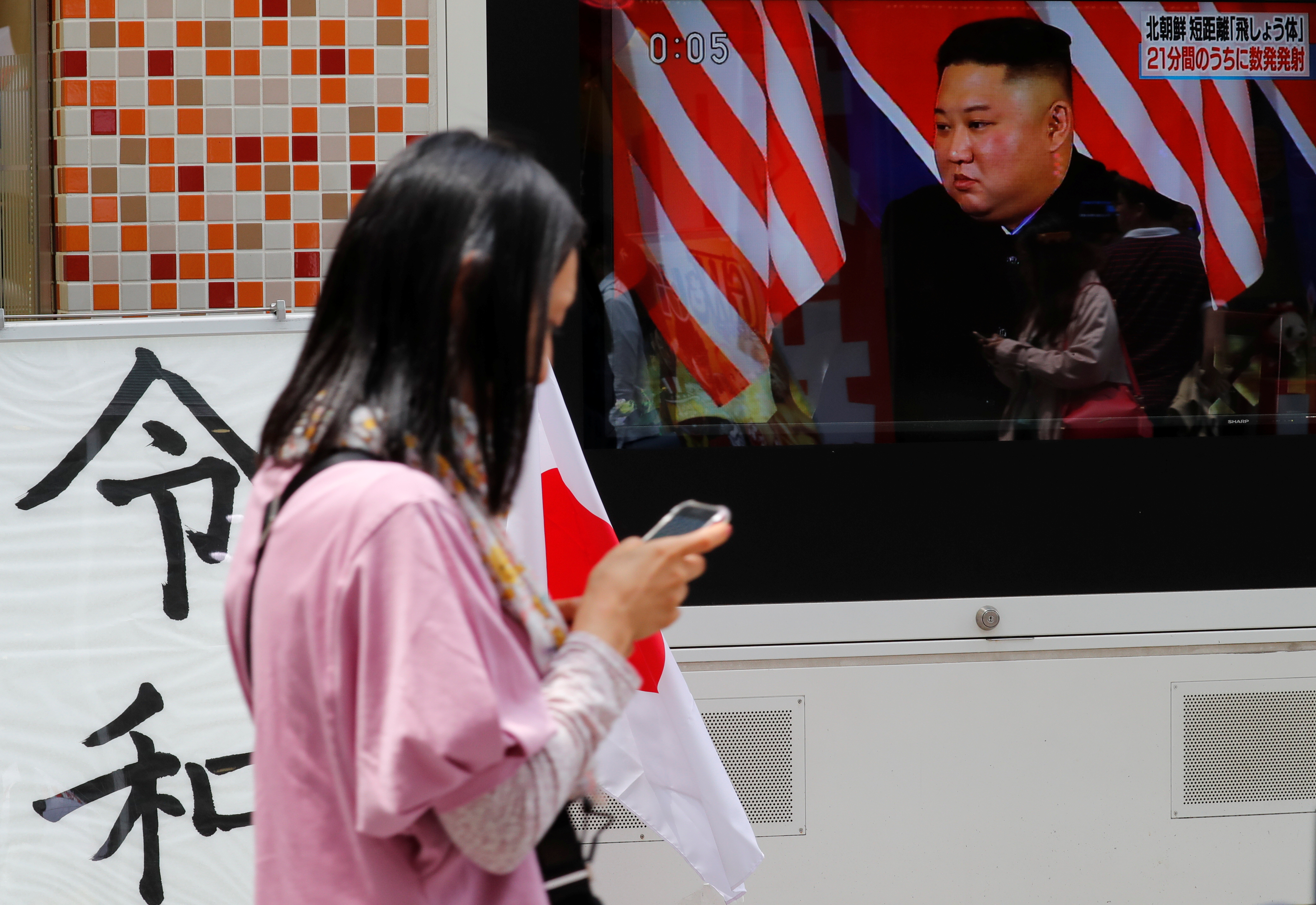 north korea fires projectiles