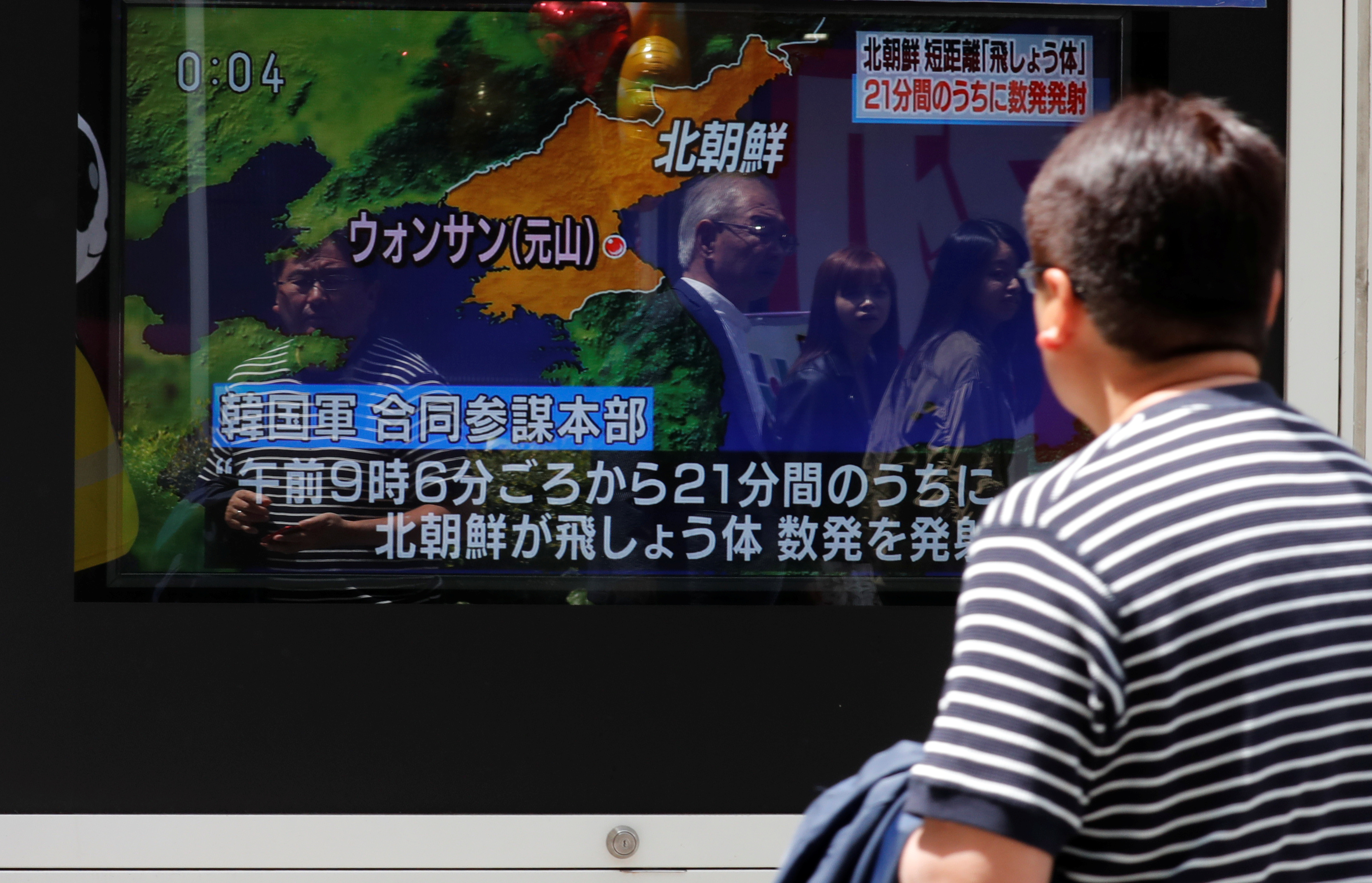 north korea fires projectiles