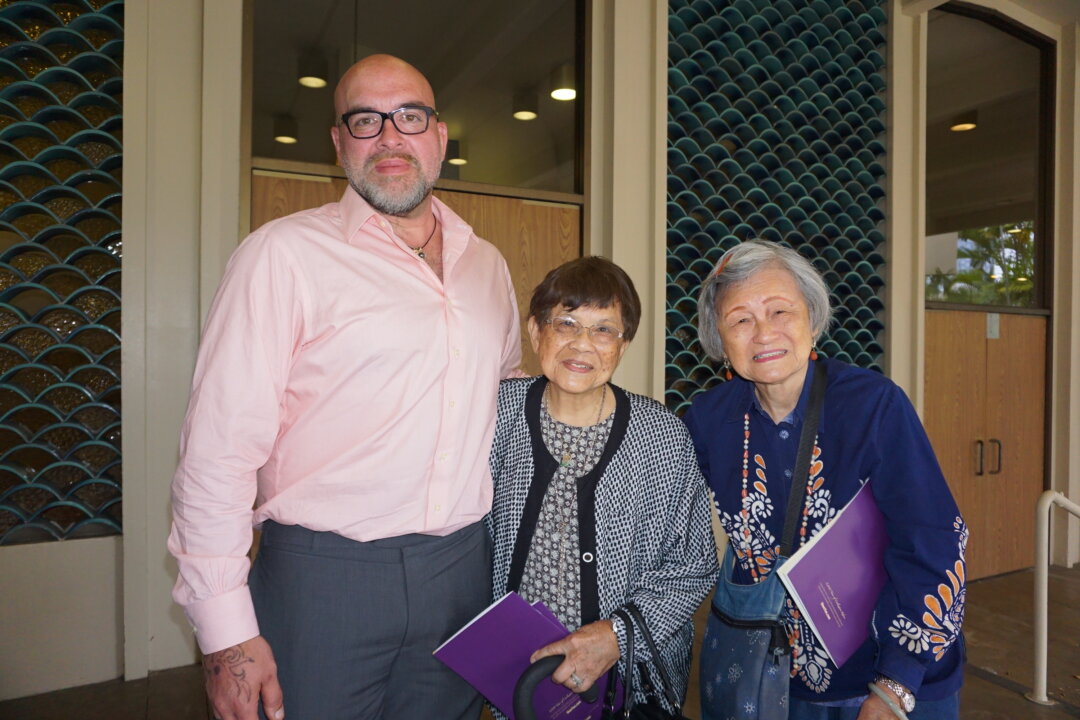 Michael Guigui with his mother (C) at Blaisdell Concert Hall in Honolulu, Hawaii, on May 4, 2019. (Sally Sun/The Epoch Times)