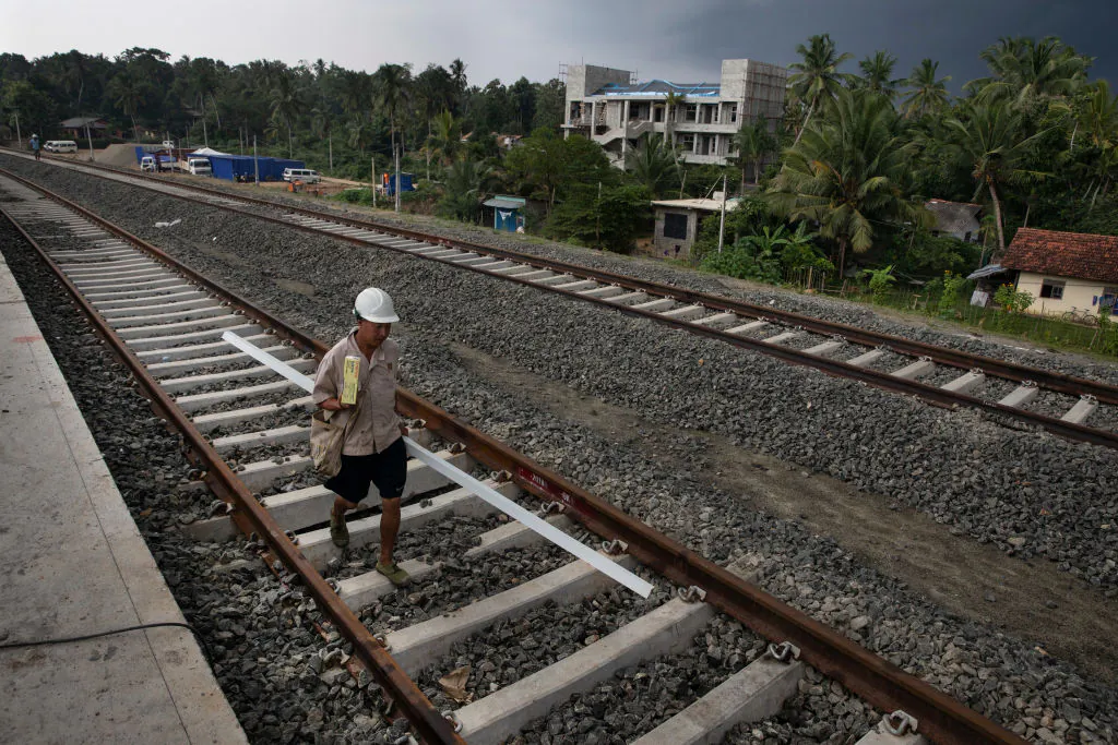 Chinese workers help to build a new train station in Beliatta, Sri Lanka which is Chinese managed and designed on Nov. 18, 2018 (Paula Bronstein/Getty Images)