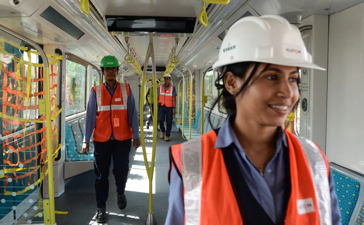 Metro rail technicians check on the 'Sydney Metro' final train set at Alstom's metro rail construction facility in Sri City, some 55 km north of Chennai, on Dec. 6, 2018. (ARUN SANKAR/AFP/Getty Images)