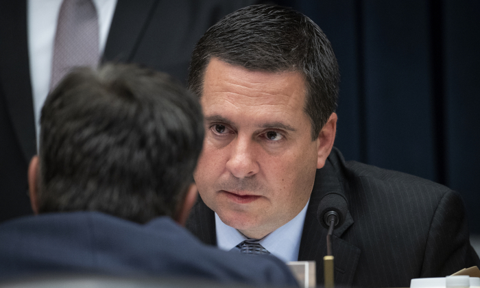 House Select Committee on Intelligence ranking member Devin Nunes (R-CA) confers with Rep. John Ratcliffe (R-TX) (back to camera) during a hearing concerning 2016 Russian interference tactics in the U.S. elections, in the Rayburn House Office Building, March 28, 2019 in Washington. (Drew Angerer/Getty Images)