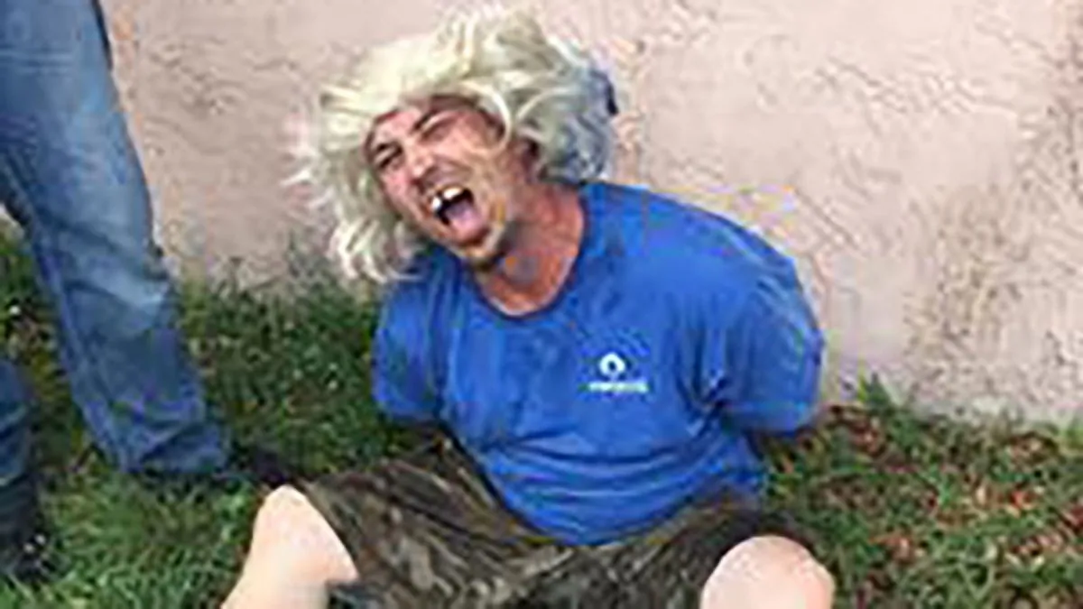 Bobby Walls was arrested on several charges while wearing a "hideous" wig ((Brevard County Sheriff's Office))
