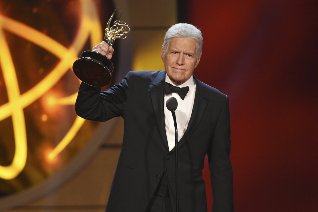 Alex Trebek accepts the award for outstanding game show host for "Jeopardy!" at the 46th annual Daytime Emmy Awards at the Pasadena Civic Center in Pasadena, Calif., on May 5, 2019. (Chris Pizzello/Invision/AP)