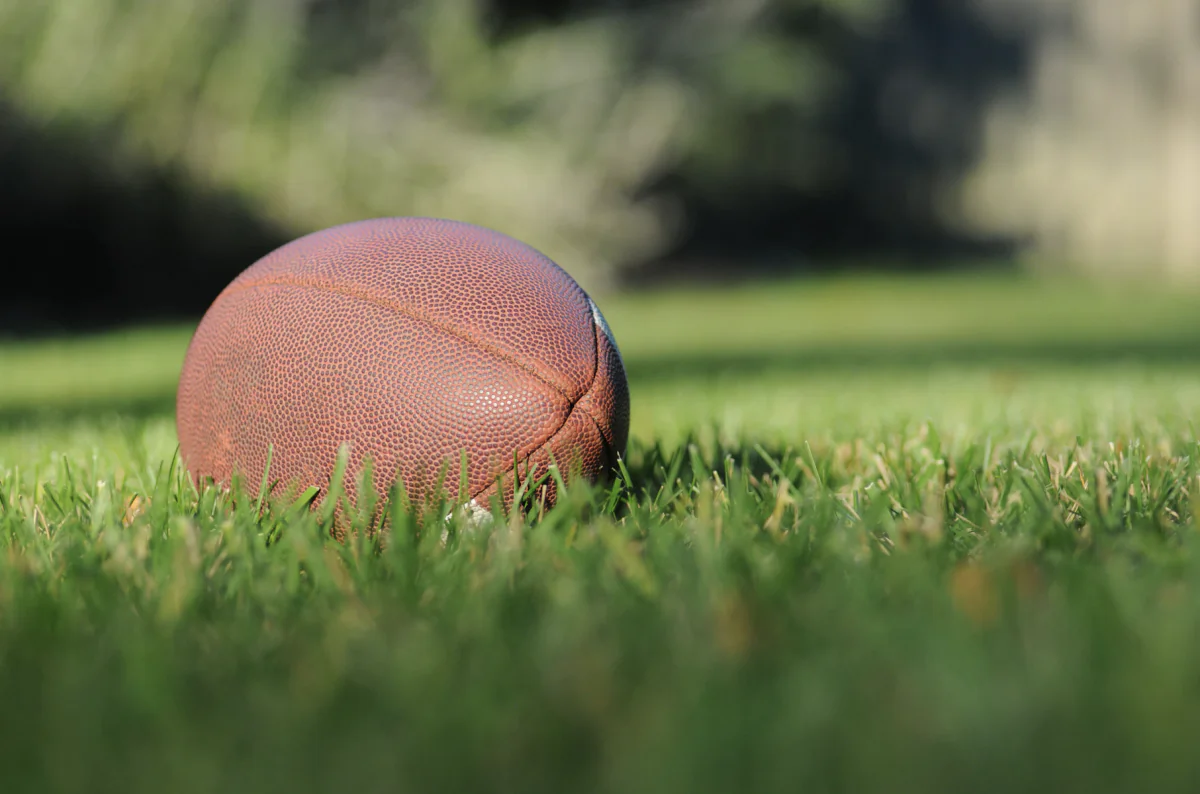 A football in a stock photograph. (Ben Hershey/Unsplash)
