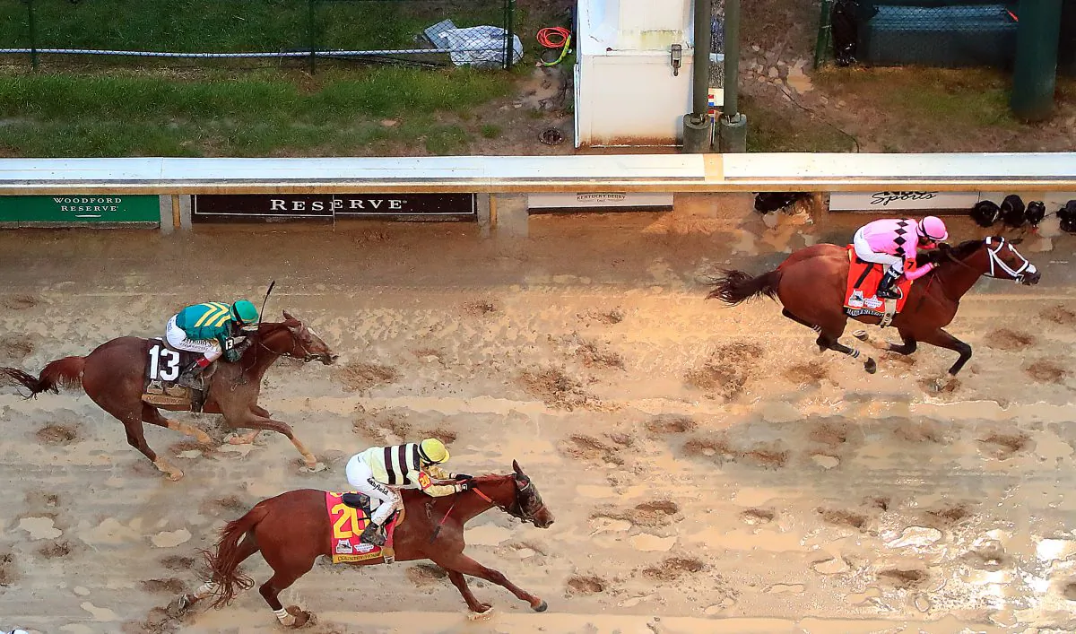 Country House #20, ridden by jockey Flavien Prat, crosses the finish line to win the 145th running of the Kentucky Derby at Churchill Downs in Louisville, Ky., on May 4, 2019. Country House #20 was declared the winner after a stewards review disqualified Maximum Security #7. Jamie Squire/Getty Images)