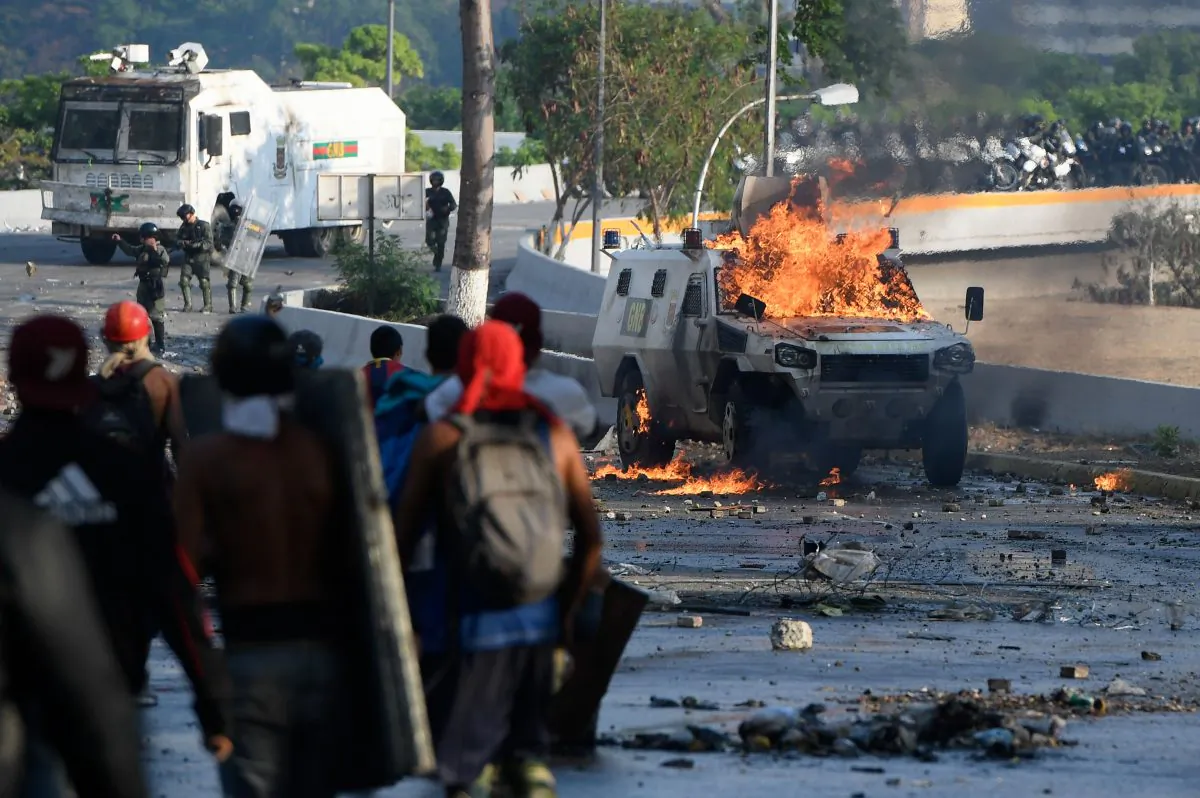 Anti-government protesters clash with security forces in Caracas during the commemoration of May Day on May 1, 2019. (Federico Parra/AFP/Getty Images)