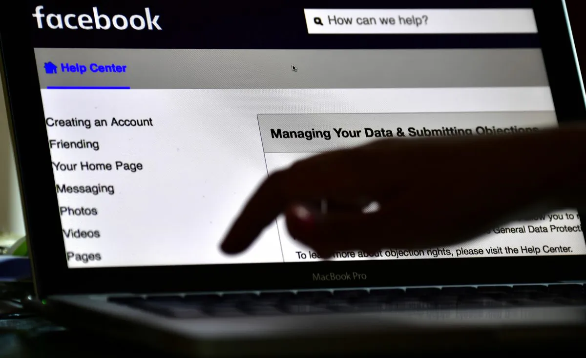 A woman managing her Facebook account in Berlin on May 22, 2018. (Tobias Tobias Schwarz/AFP/Getty Images)