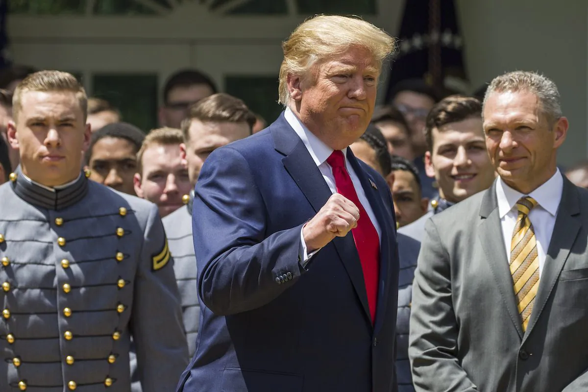 President Donald Trump pumps his fist as he departs after the presentation of the Commander-in-Chief's Trophy to the U.S. Military Academy at West Point football team, in the Rose Garden of the White House on May 6, 2019. (Alex Brandon/AP Photo)