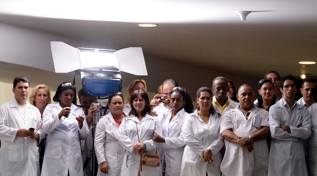 Cuban physicians attend the sanctioning of the law establishing the More Doctors Program in Brasilia, Brazil, on Oct. 22, 2013.   (EVARISTO SA/AFP/Getty Images)
