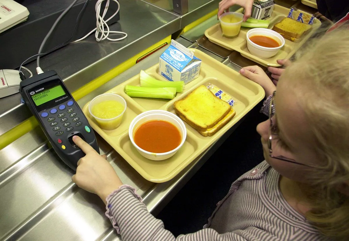 In this file image a first-grader uses fingerprint scanner to pay for lunch at Penn Cambria Pre-Primary School on March 1, 2002 in Cresson, PA.(William Thomas Cain/Getty Images)