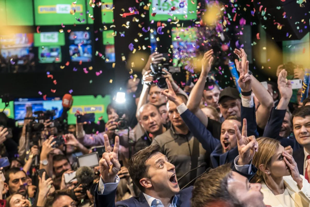 Volodymyr Zelenskiy (C) celebrates his apparent victory in Ukraine's presidential race at his election-day headquarters after polls closed in Kiev, Ukraine on April 21, 2019. (Brendan Hoffman/Getty Images)