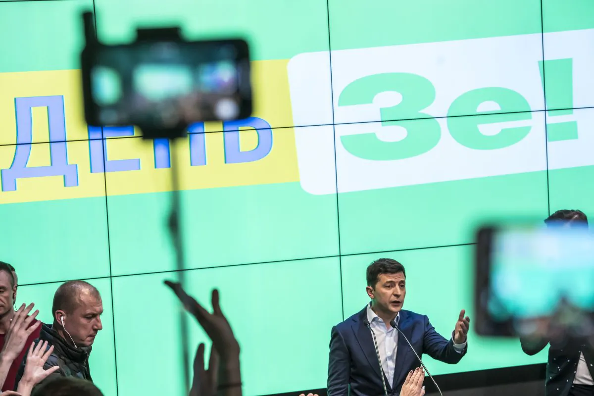 Ukrainian presidential candidate Volodymyr Zelenskiy speaks to journalists at his election-day headquarters after polls closed in Kiev, Ukraine on April 21, 2019. (Brendan Hoffman/Getty Images)