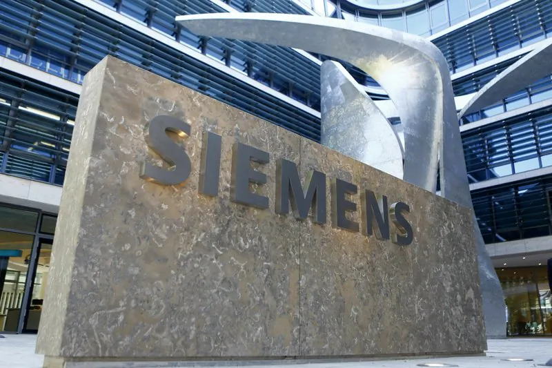 The logo of German industrial conglomerate Siemens at the new headquarters in Munich, Germany, on June 24, 2016. (Matthias Schrader/File Photo via AP)