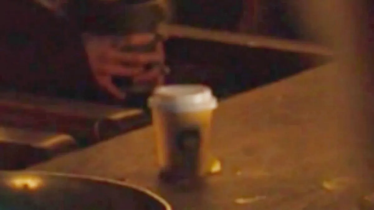 Twitter is convinced it's a Starbucks cup, but it really could be from anywhere. (HBO via CNN)