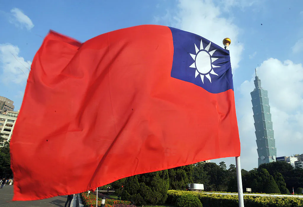 Taiwan's national flag flutters beside Taipei 101 at Sun Yat-sen Memorial Hall in Taipei on Oct. 7, 2012. (Mandy Cheng/AFP/Getty Images)