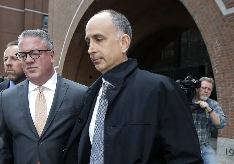 California businessman Stephen Semprevivo departs federal court in Boston, on May 7, 2019, after pleading guilty to charges that he bribed the Georgetown tennis coach to get his son admitted to the school. (Steven Senne/AP Photo)